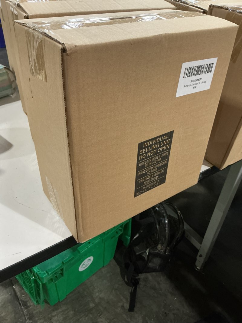 Condition photo showing New/Like New for mdesign small modern 1.3 gallon rectangle metal lidded step trash can, compact garbage bin with removable liner bucket and handle for bathroom, kitchen, craft room, office, garage - bronze bronze 1.3 gallon