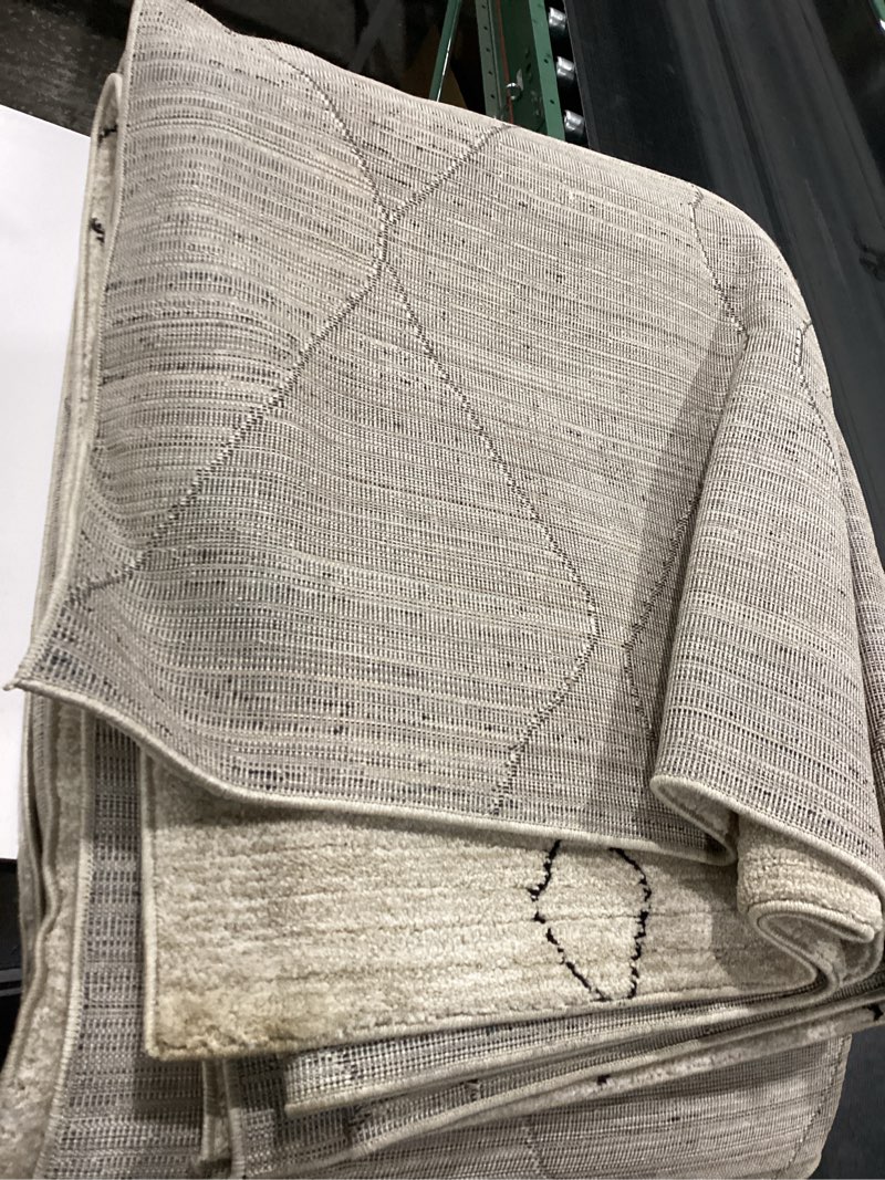 Condition photo showing As Is for loloi darby collection dar-03 sand/charcoal 9'-2" x 13' area rug sand / charcoal 9'2" x 13' (rectangular)