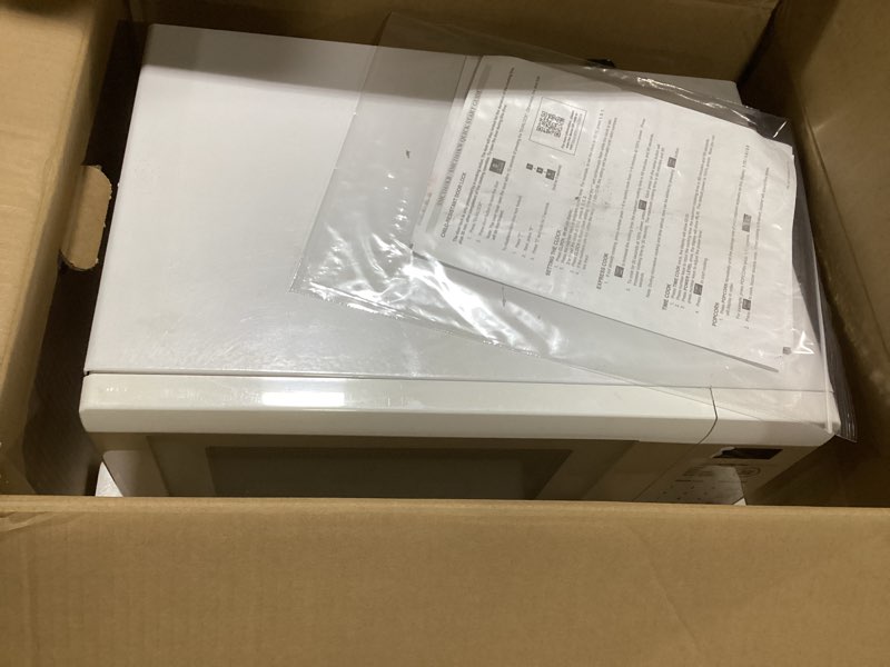 Condition photo showing As Is for sharp smc1161kw oven with removable 12.4" carousel turntable, cubic feet, 1000 watt countertop microwave, 1.1 cuft, white