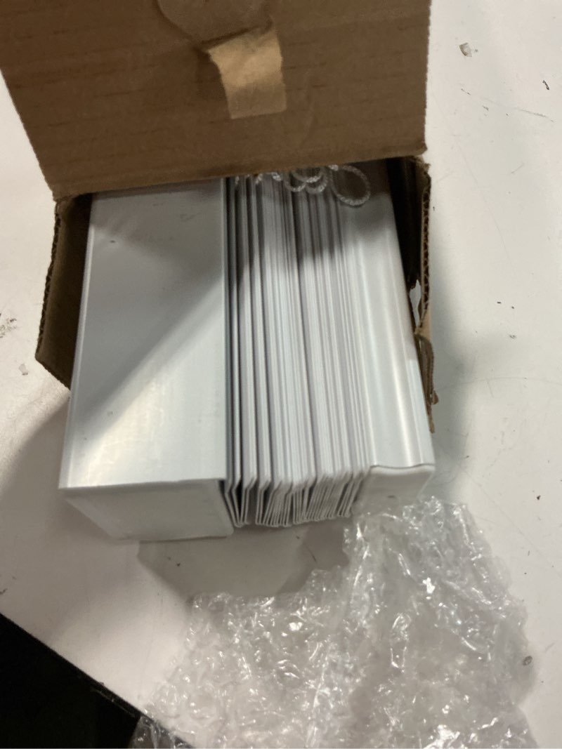 Condition photo showing As Is for project source premium 2-in slat width 35-in x 64-in cordless white vinyl room darkening horizontal blinds