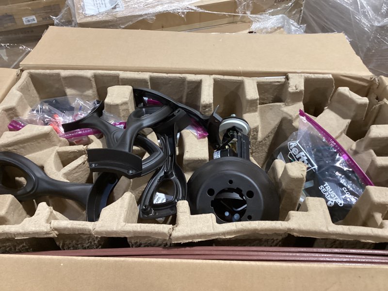 Condition photo showing As Is for harbor breeze coastal creek 52-in bronze with toffee/cocoa blades ceiling fan with light 