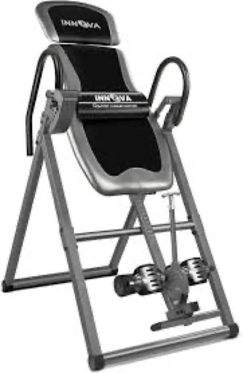 innova inversion table with adjustable headrest, reversible ankle holders, and 300 lb weight capacity