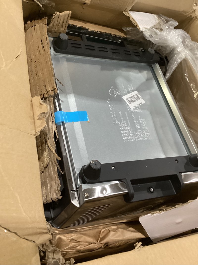 Condition photo showing As Is for Not tested Cuisinart Air Fryer Toaster Oven, 1800W, 8-in-1 with Air Fry, Convection, Broil & Warm, 0.6 Cubic Feet, 60-Minute Timer, TOA-70NAS, Stainless Steel Stainless Steel Convection Toaster Air Fryer Oven w/ Grill