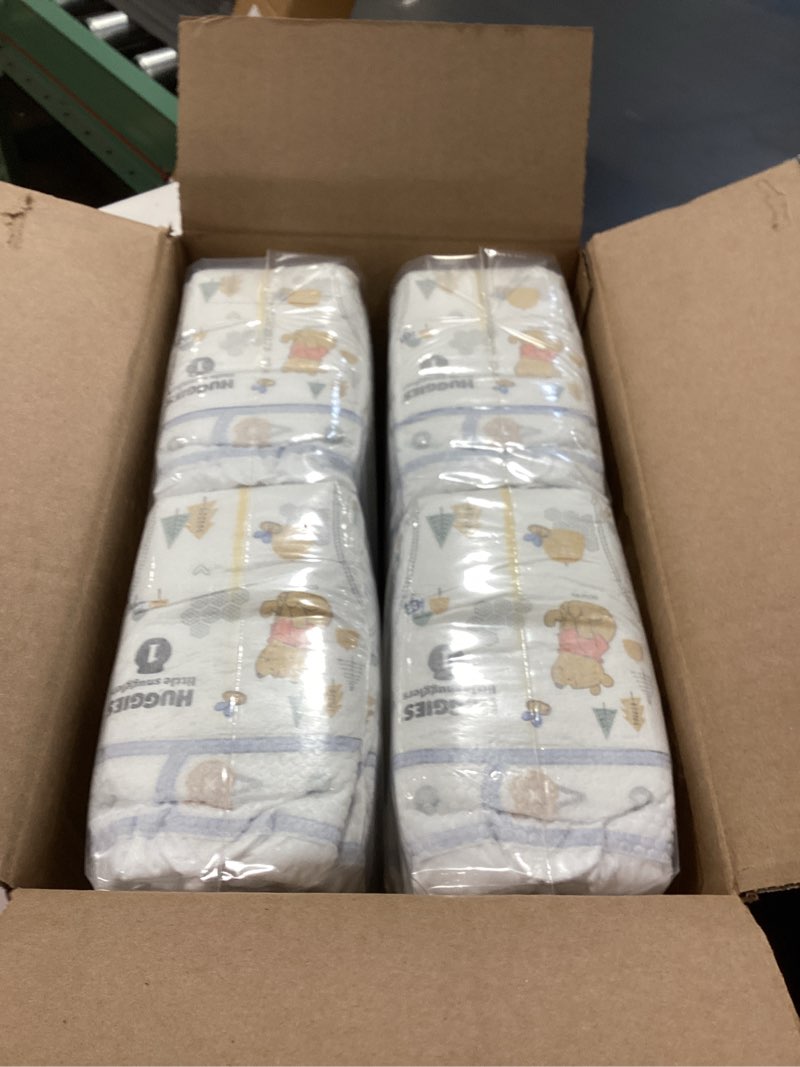 Condition photo showing New/Like New for Huggies Size 1 Diapers, Little Snugglers Baby Diapers, Size 1 (8-14 lbs), 96 Count, Packaging May Vary Size 1 96
