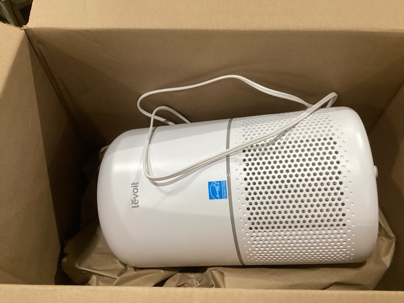 Condition photo showing As Is for levoit air purifiers for bedroom home dorm, aham verified, 3-in-1 filter cleaner with aroma pad, filters smoke, allergens, pet dander, odor, dust, office, desktop, core mini-p, white white core mini, not tested, similar to stock photo