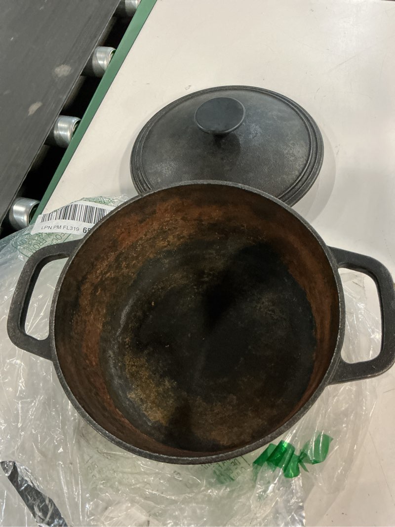 Condition photo showing As Is for Amazon Basics Round Pre-Seasoned Cast Iron Dutch Oven Pot with Lid and Dual Handles, Heavy-Duty & Large, 7-Quart, Black