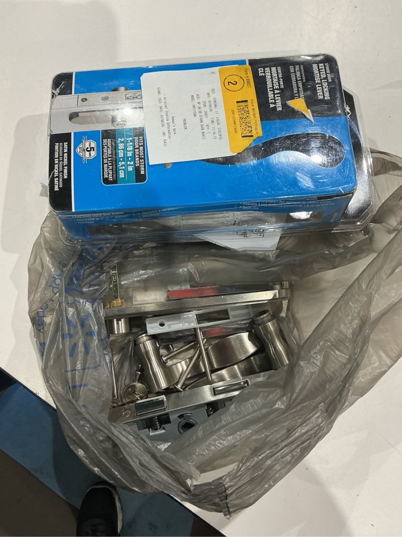 Condition photo showing As Is for serenade mortise keyed lever mount latch with deadbolt for screen and storm doors, satin nickel