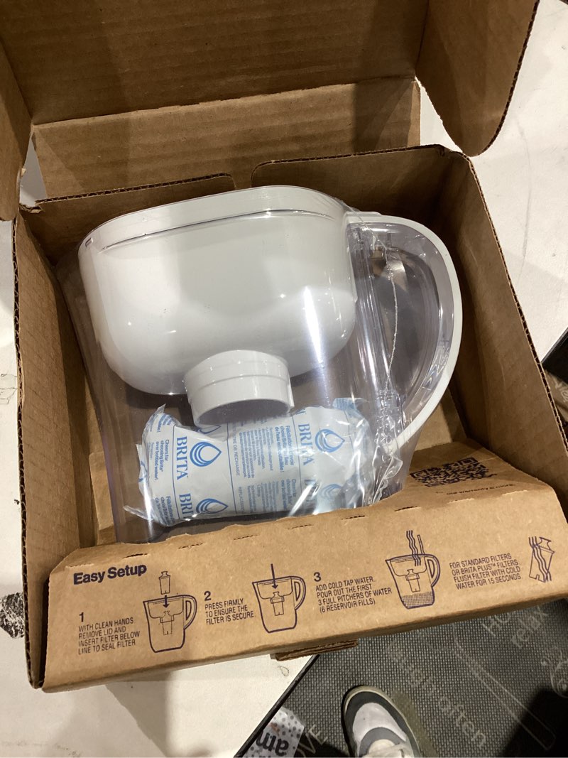 Condition photo showing As Is for Brita Metro Water Filter Pitcher with SmartLight Change Indicator, BPA-Free, Replaces 1,800 Plastic Water Bottles a Year, Lasts Two Months, Includes 1 Filter, Small - 6-Cup Capacity, White Standard White