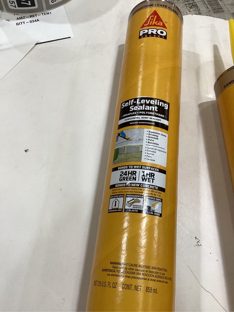Condition photo showing Good Condition for Sikaflex Self Leveling Sealant, Sandstone, Polyurethane with an Accelerated Curing Capacity for Sealing Horizontal Expansion Joints in Concrete, 29 fl. oz Cartridge