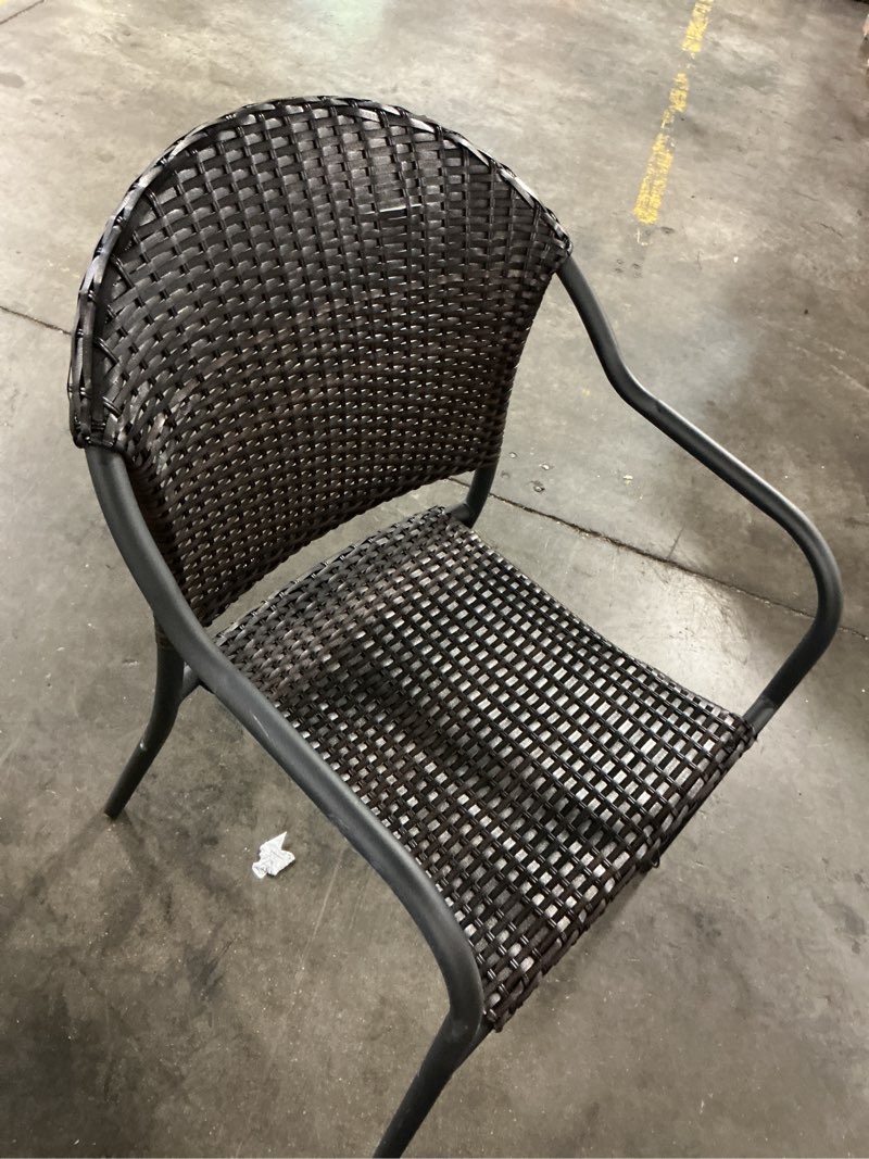 Condition photo showing As Is for 100+ bought last week style selections pelham bay wicker stackable matte black steel frame stationary dining chair