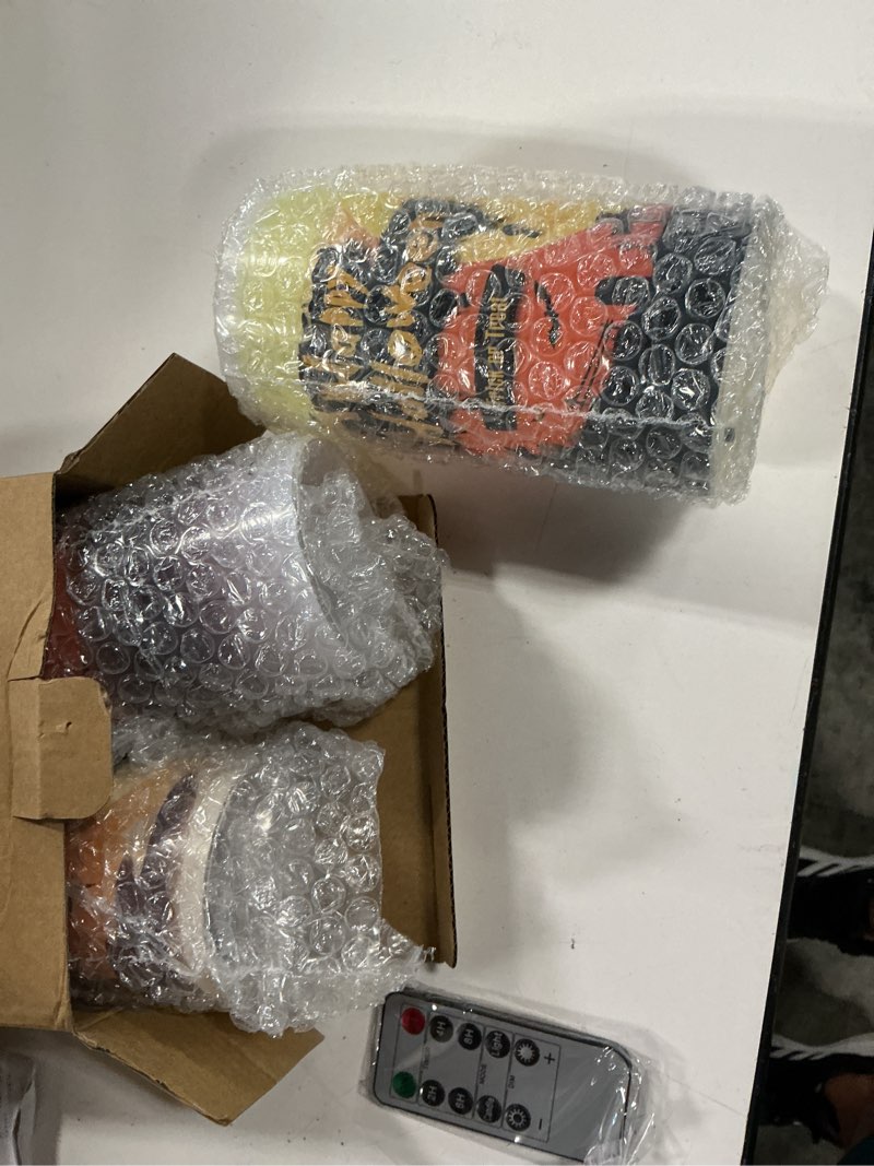 Condition photo showing New/Like New for 3-pack 3 x 6 in. halloween flameless pillar candles:remote timer, battery operated real wax led, warm white flickering