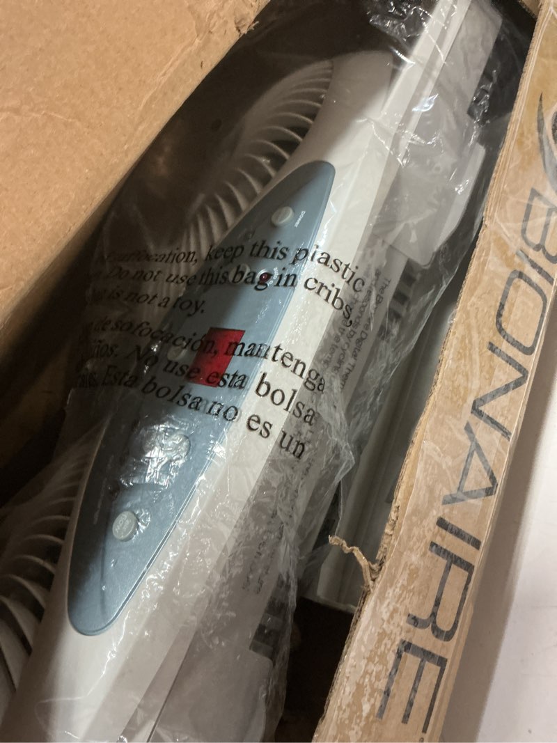 Condition photo showing As Is for bionaire window fan with reversible airflow blades – 3-speed settings, programmable thermostat, led display, remote control, fits 24–36" windows, no assembly required white 2 blades electronic control with lcd screen window fan