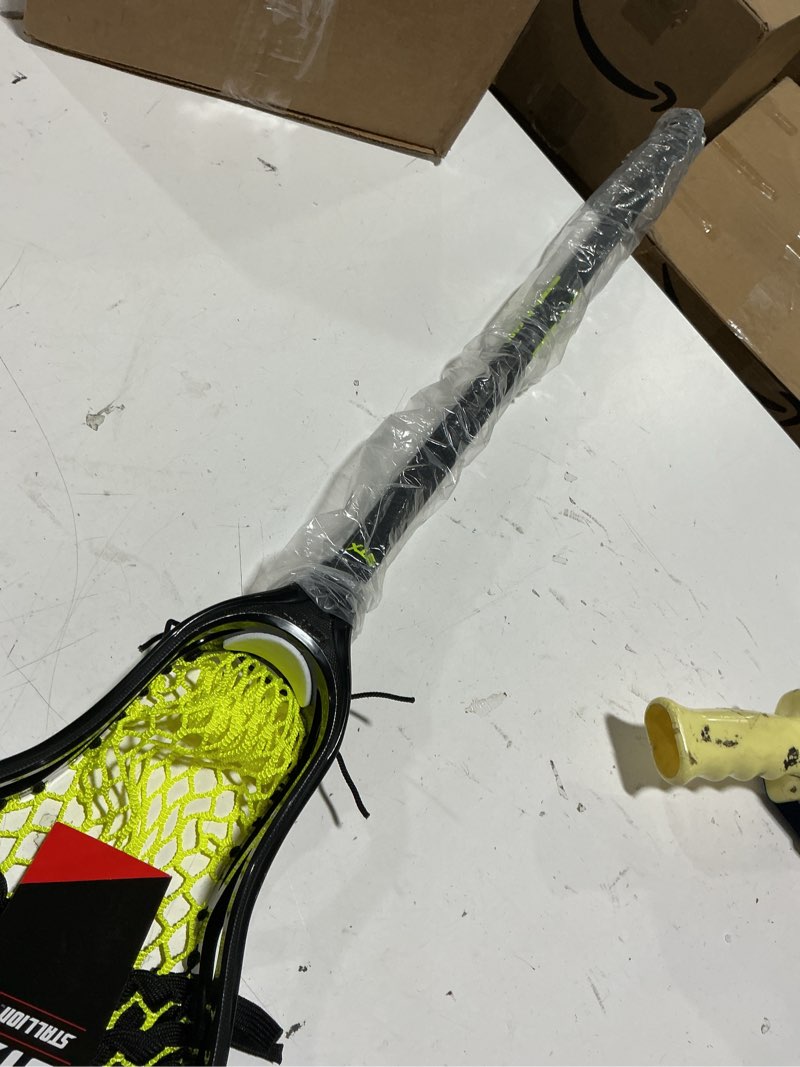 Condition photo showing New/Like New for stx lacrosse stallion 200 boys complete stick with mesh pocket, attack/midfielder black/yellow