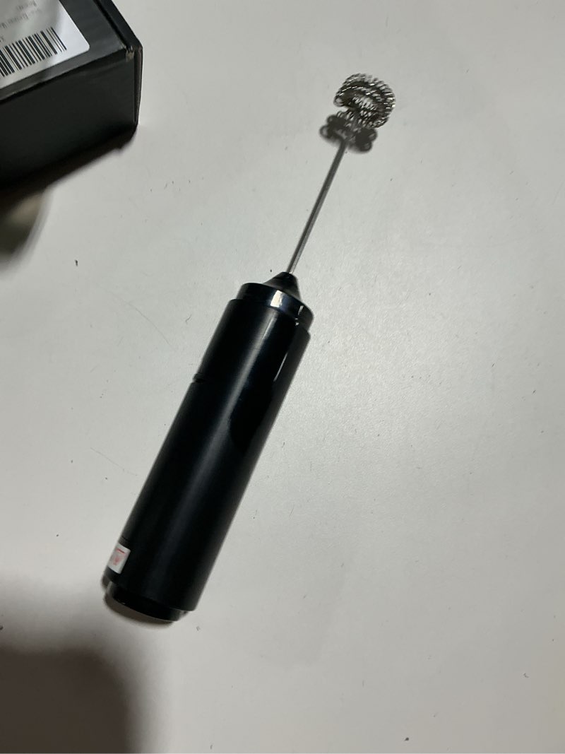 Condition photo showing As Is for Electric milk frother with storage cover, battery powered, stainless steel mixer, matte black low decibel coffee frother
