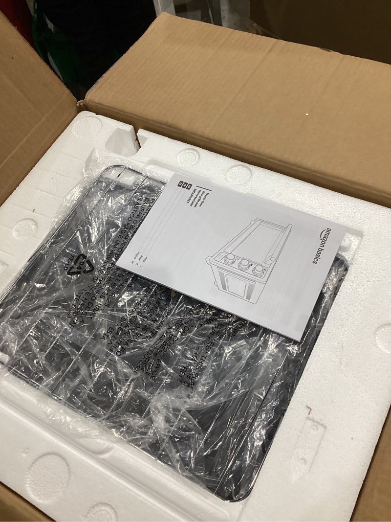 Condition photo showing Good Condition for Amazon Basics 6-Slice 23-QT Toaster Oven with Built-In Air Fryer, 7-In-1 Cooking Options, 60-Min Timer & Adjustable Temperature (200? - 450?), With Accessories, 1500W, Stainless Steel, Silver/Gray