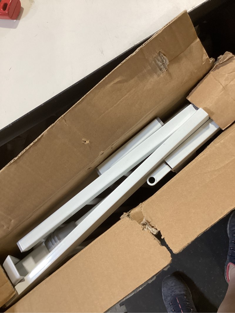 Condition photo showing As Is for regalo easy step 49-inch extra wide baby gate, includes 4-inch and 12-inch extension kit, 4 pack of pressure mount kit and 4 pack of wall mount kit white 29-49"w x 30"h
