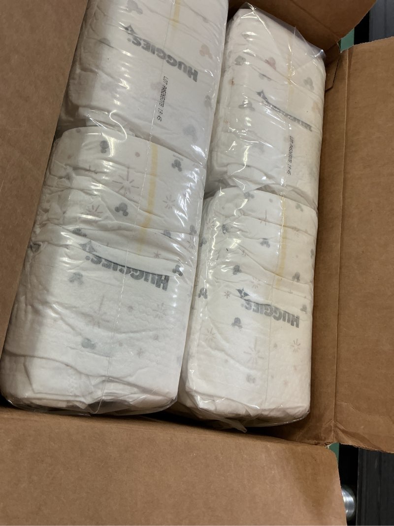Condition photo showing New/Like New for huggies skin essentials luxury diapers - size 1 - 84ct