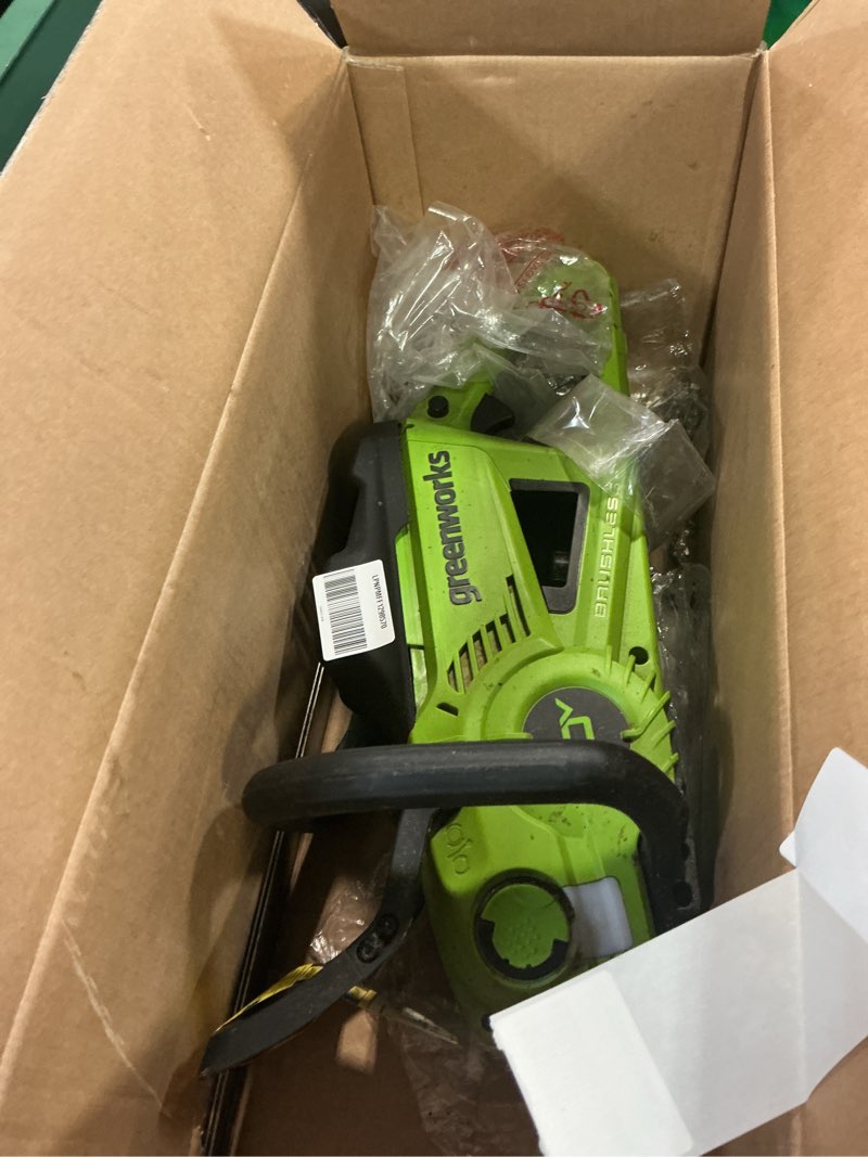 Condition photo showing As Is for Greenworks 40V 18" Brushless Cordless Chainsaw (Great For Tree Felling, Limbing, Pruning, and Firewood / 75+ Compatible Tools), 8.0Ah Battery and Rapid Charger Included