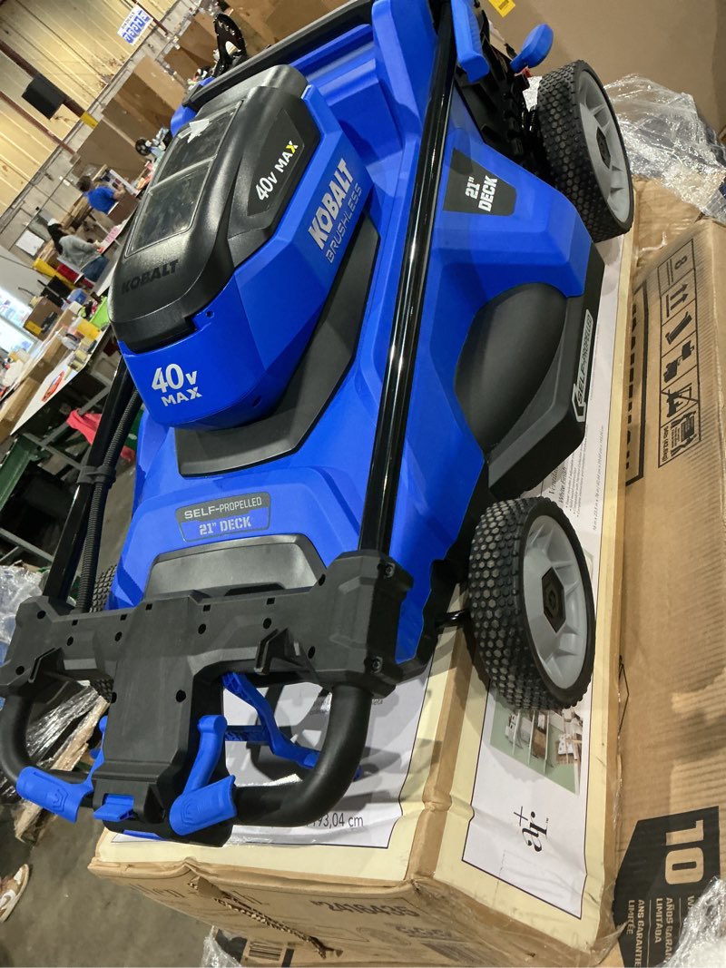 Condition photo showing As Is for kobalt 40-volt 21-in self-propelled battery mower (6 ah battery charger included)