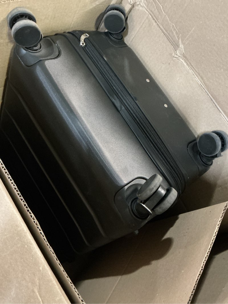 Condition photo showing As Is for olixis central hardside expandable luggage with spinner wheels, black, 28 in black 28 in