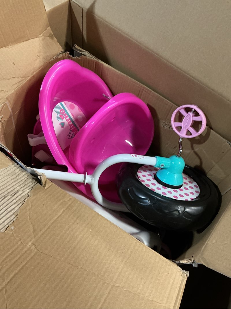 Condition photo showing As Is for Huffy Disney Minnie Mouse Girl's Trike, Ideal for Ages 3+, Minnie Mouse Graphics, Pink Handlebar Bow Basket, Storage Bins for Snacks or Toys, Sturdy and Durable, Safe for Toddlers