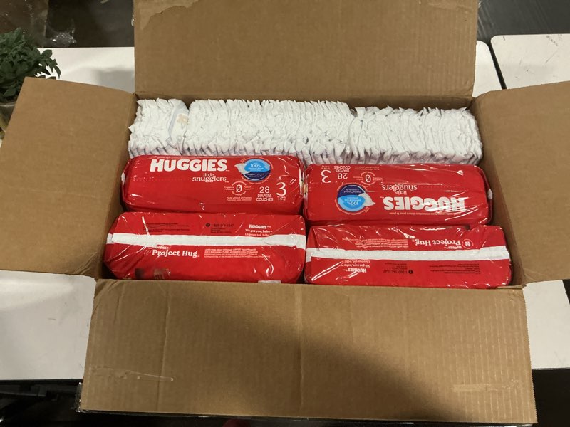 Condition photo showing As Is for huggies size 3 diapers, little snugglers baby diapers, size 3 (16-28 lbs), 168 count (6 packs of 28), packaging may vary size 3 168