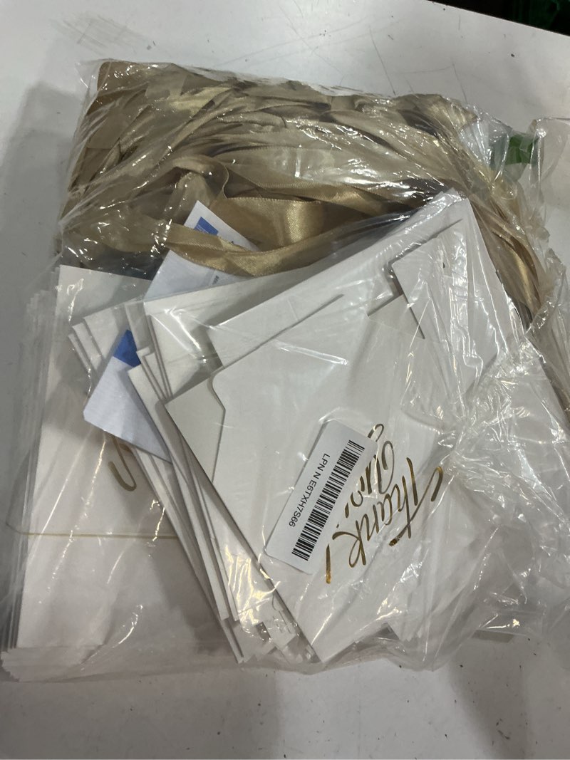 Condition photo showing Good Condition for doyide 120 pack small thank you gift bags, 4.5x1.8x3.9in party favor bags with bow ribbon, mini paper gift bag with gold foil printed, white treat boxes for birthday wedding bridal baby shower 120 count (pack of 1) white