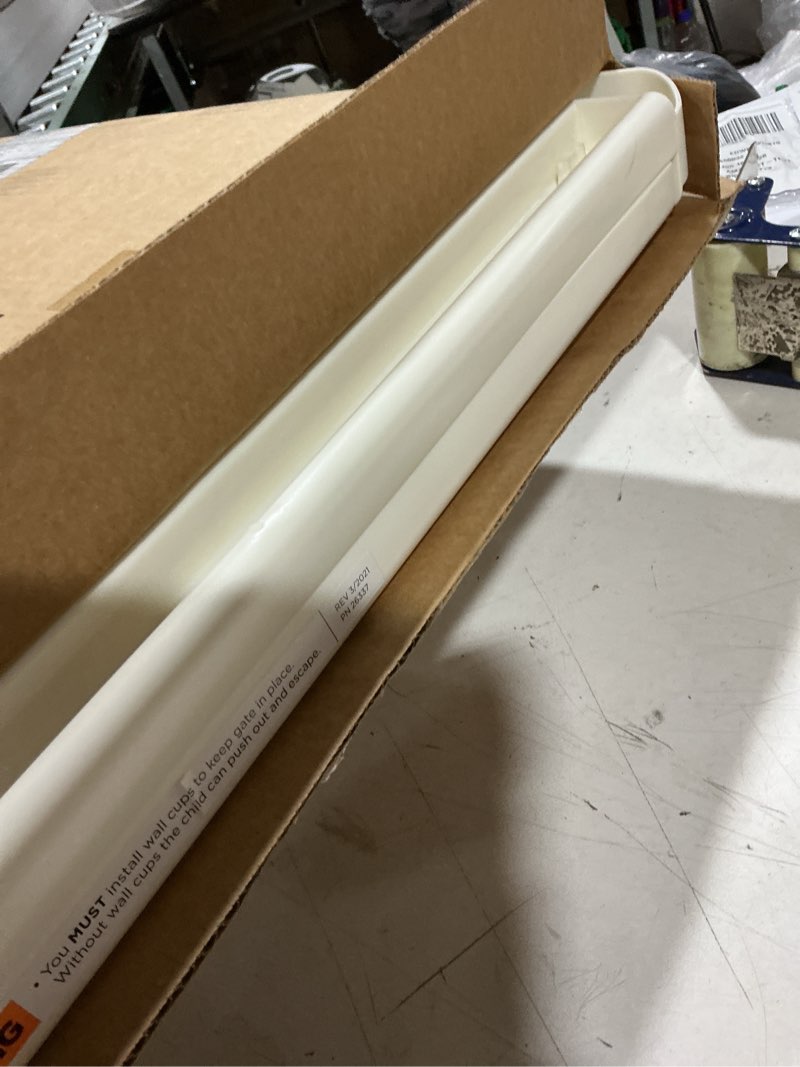 Condition photo showing As Is for toddleroo by north states 42” wide supergate ergo baby gate, made in usa: for doorways or stairways. includes wall cups. pressure or hardware mount. 26” - 42” wide (26" tall, ivory) (b0065adp4c)