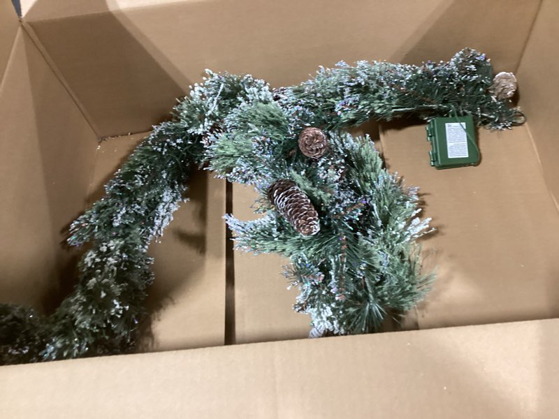 Condition photo showing Good Condition for National Tree Company 6 ft Pre-Lit Glittery Bristle Artificial Christmas Garland, Christmas Decoration with Pinecones, 50 Clear LED Lights, 138 Tips, Timer, Green