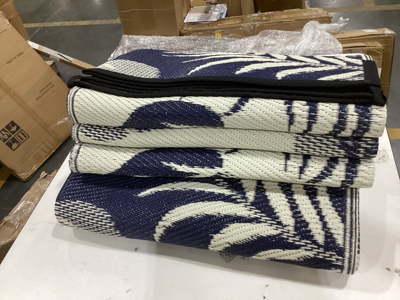 Condition photo showing Good Condition for oppodream reversible outdoor rug 9x12, waterproof outdoor plastic straw rug for patio, tropical leaf rv camping rugs for outside, deck, balcony, porch, backyard, camping, rv, black and white 9' x 12' (rectangular) black & white