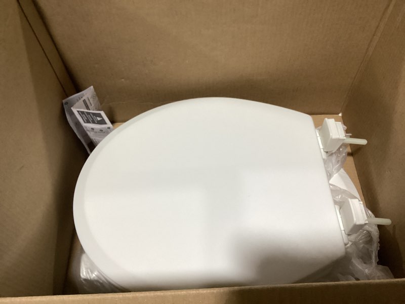 Condition photo showing New/Like New for toilet seat with toddler seat built in, potty training toilet seat, fits both adult and child, slow-close, toddler toilet seat attachment, round, heavy duty, white(16.5”) white round