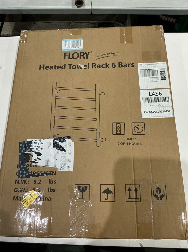 Condition photo showing Good Condition for the product is a flory brand heated towel rack with 6 bars and a built-in timer