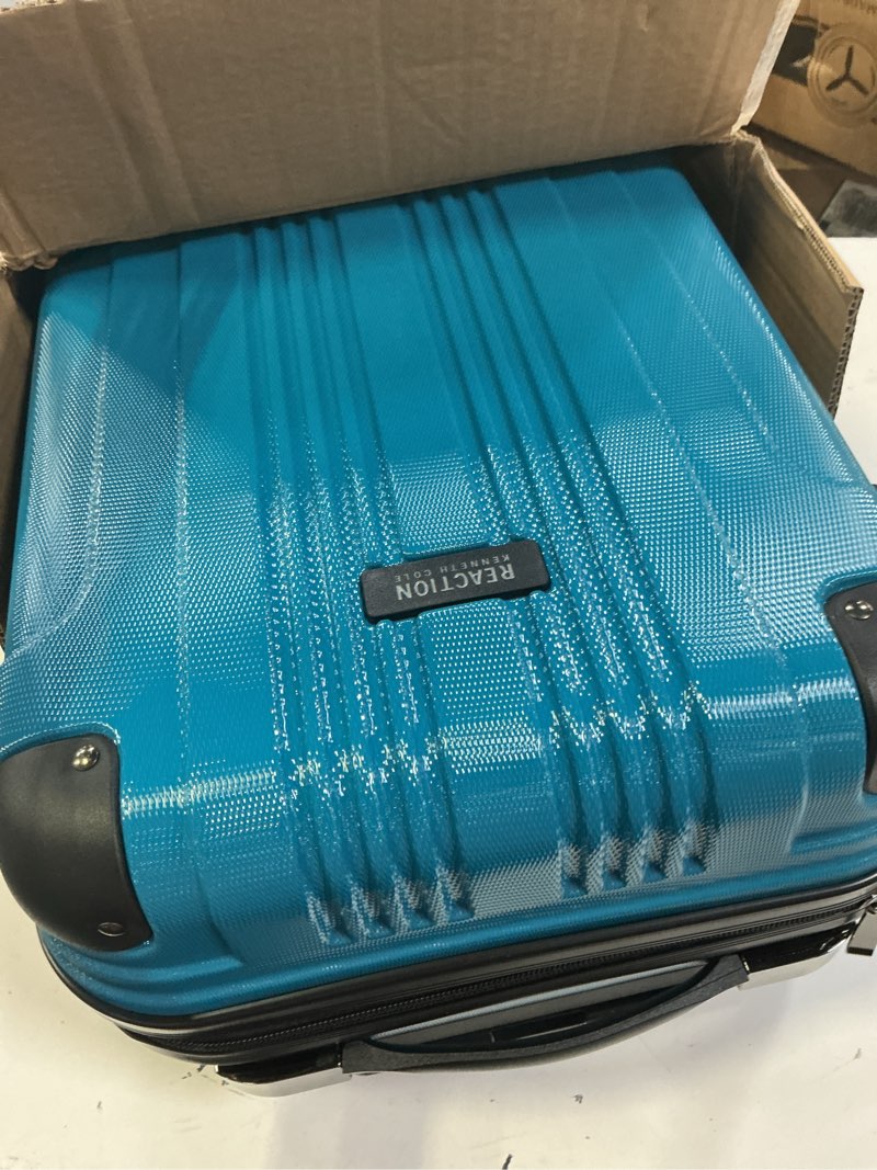Condition photo showing Good Condition for kenneth cole reaction out of bounds lightweight hardshell 4-wheel spinner luggage, teal, 20-inch carry on 20-inch carry on teal