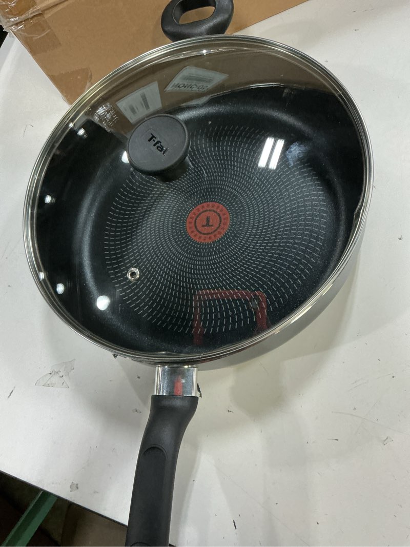Condition photo showing Good Condition for tefal titanium essential sautepan 26 cm + lid, non-stick coating, metal spatula safe, compatible with all hobs except induction, b9413344