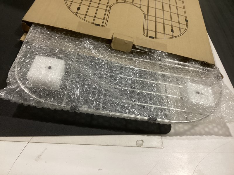 Condition photo showing Good Condition for YORZSDI Kitchen Sink Grid 18-7/8" x 16-3/4" - Heavy Duty Kitchen Sink Protector with Built-in Strainer & Rear Drain, Non-Slip Rubber Feet & Scratch Resistant Bottom Guard Rear Drain 18.87 x 16.75