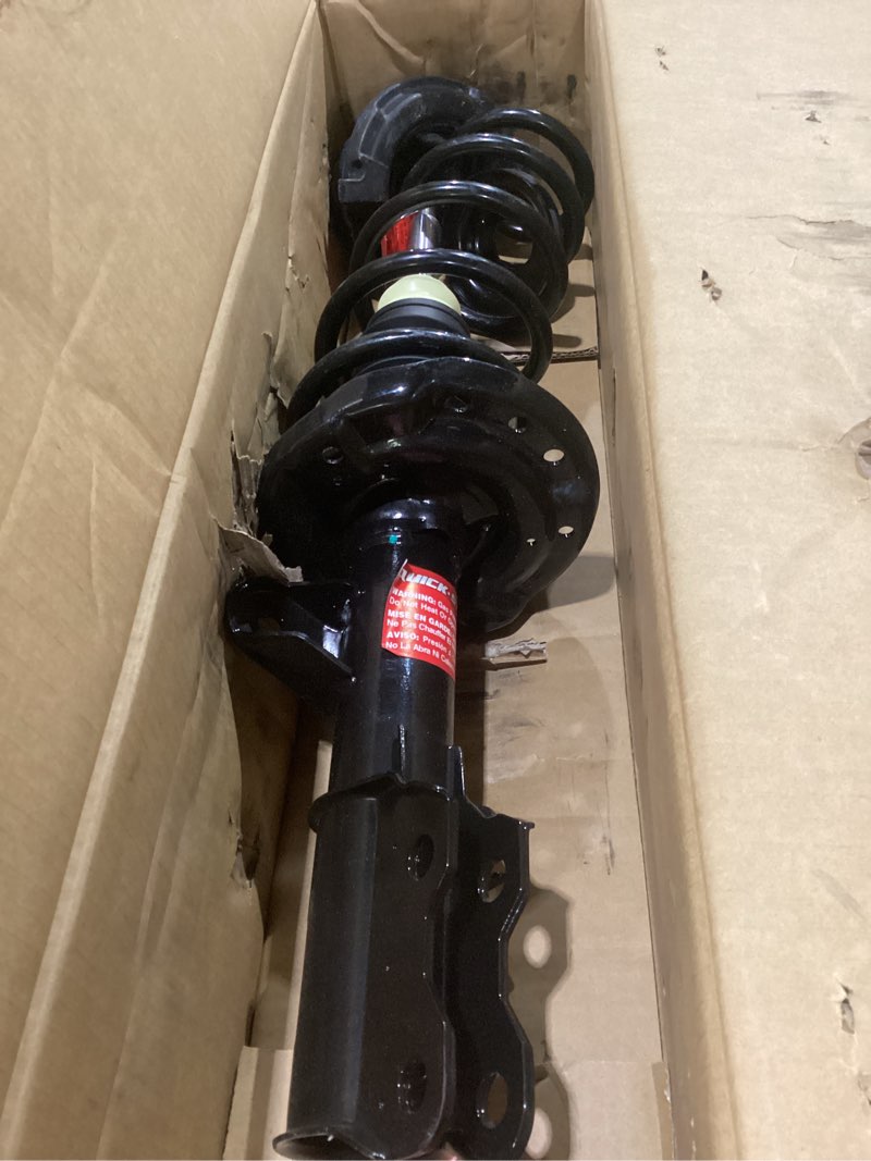 Condition photo showing As Is for monroe shocks & struts 272934 monroe quick-strut complete strut assembly suspension strut and coil spring assembly