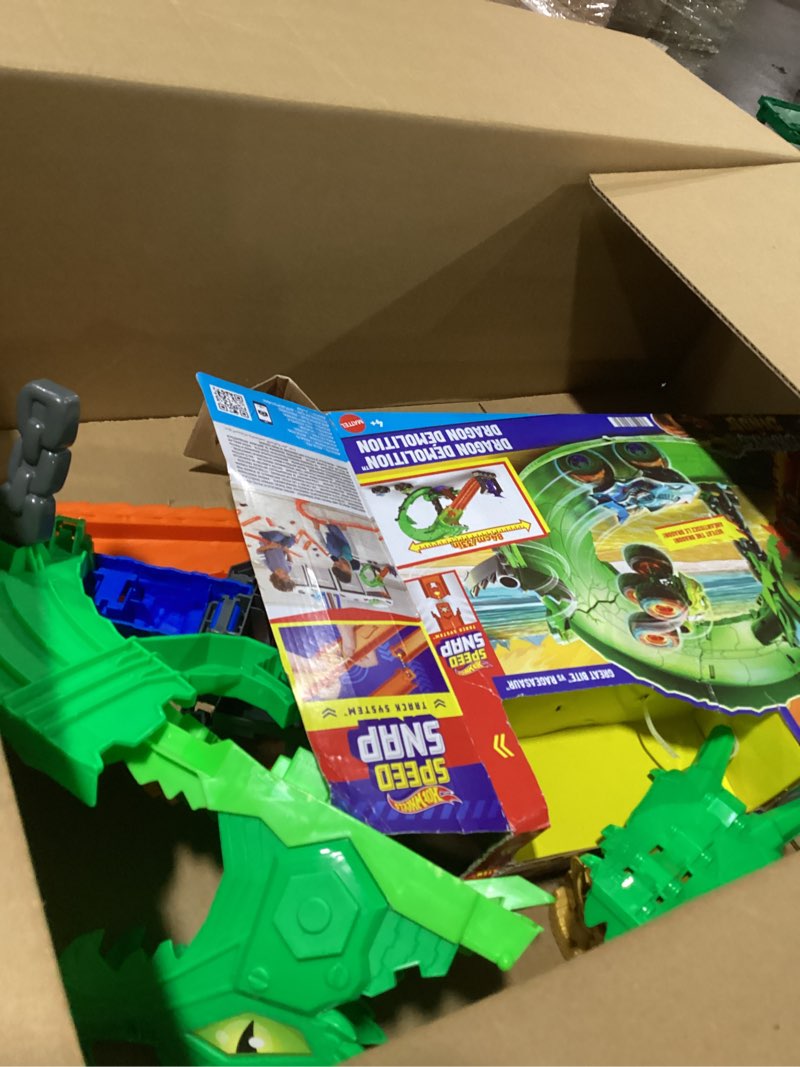 Condition photo showing As Is for hot wheels toy monster trucks, sharks vs. dinos dragon destruction playset with 1:64 scale great bite & rageasaur, race to defeat the cyborg nemesis dragon track set