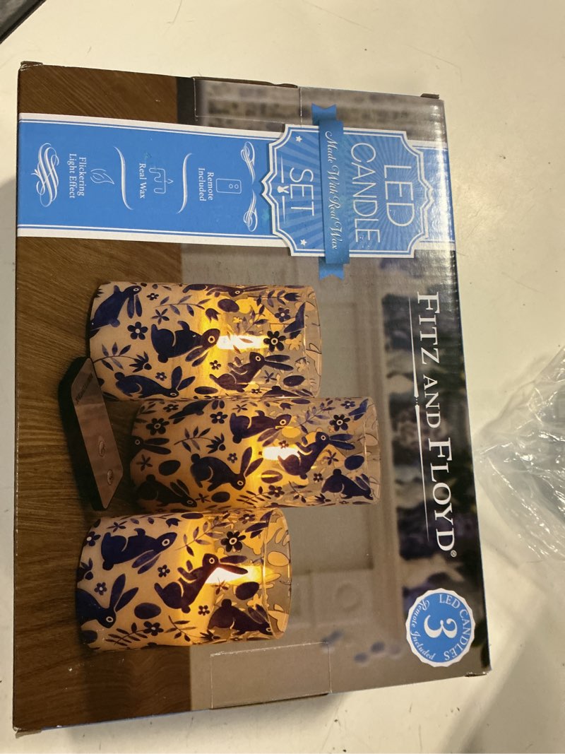 Condition photo showing New/Like New for fitz & floyd bunny decal 3-pk. led wax filled glass pillars, multi