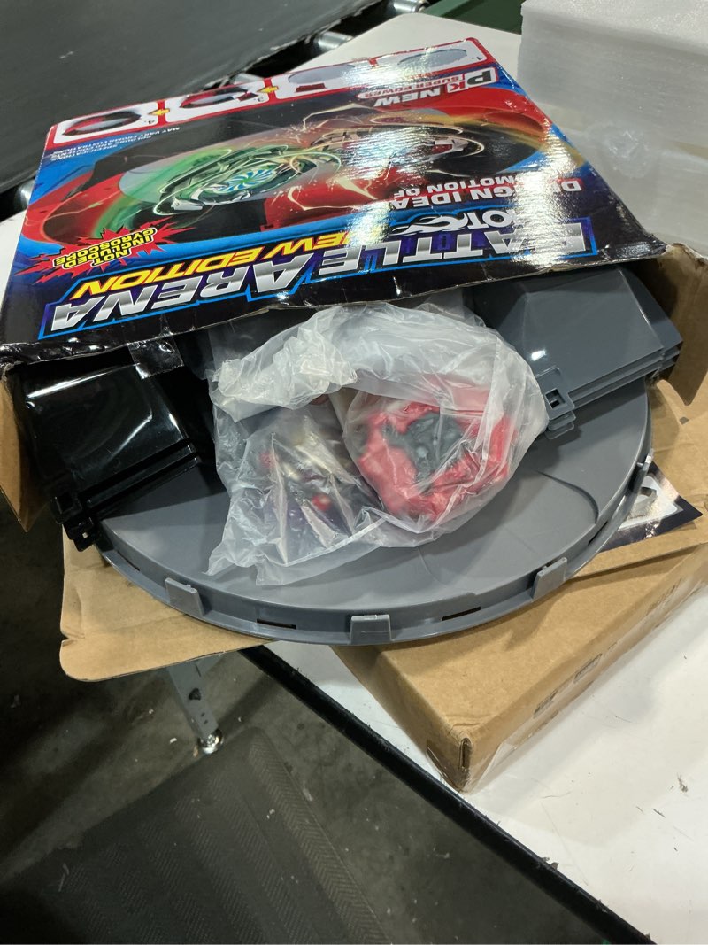Condition photo showing Good Condition for battle arena burst tops set with 17.8 inch large stadium, 6 spinning tops with two launchers, complete battle set (grey)