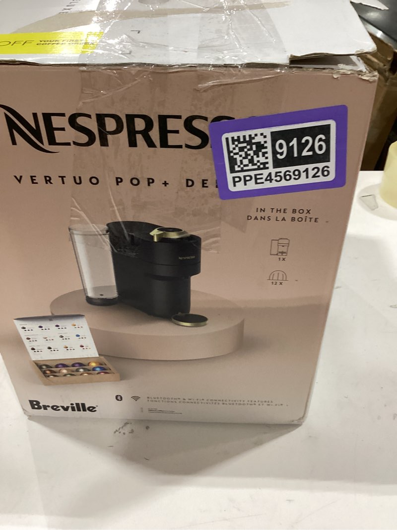 Condition photo showing New/Like New for Nespresso Festive Vertuo Pop+ Coffee and Espresso Maker by Breville, Matte Black Gold, 37.2 Fl Oz capacity Machine Only Matte Black Gold