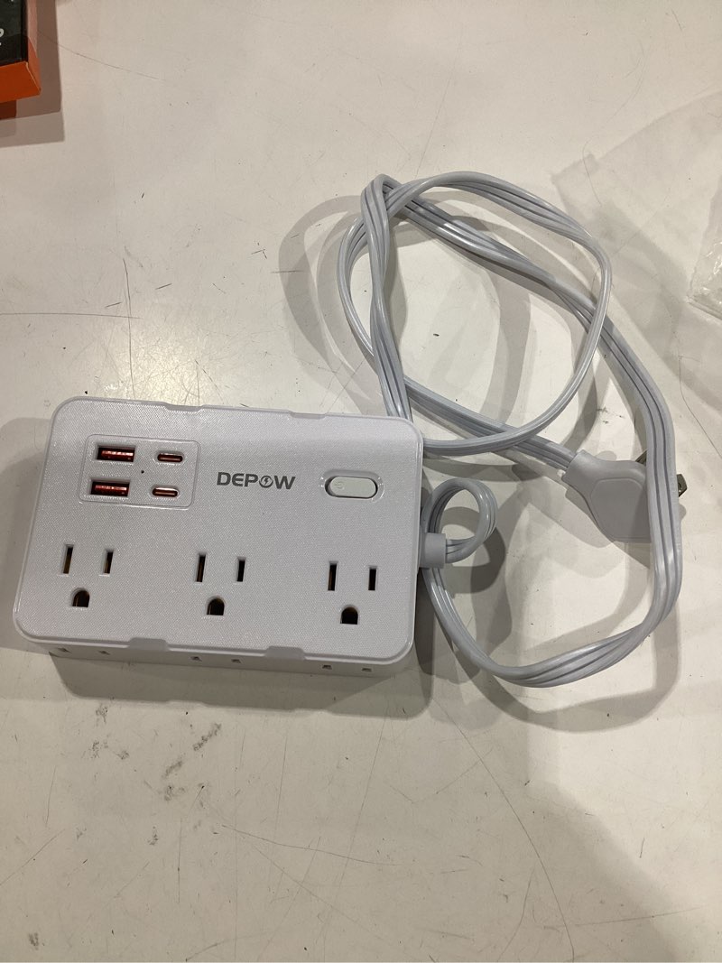 Condition photo showing Good Condition for depow surge protector power strip, 3 ft extension cord with 6 ac outlets(1625w/13a) 4 usb ports,1050j surge protection, wall mountable charging station for office, home, white white 3 ft