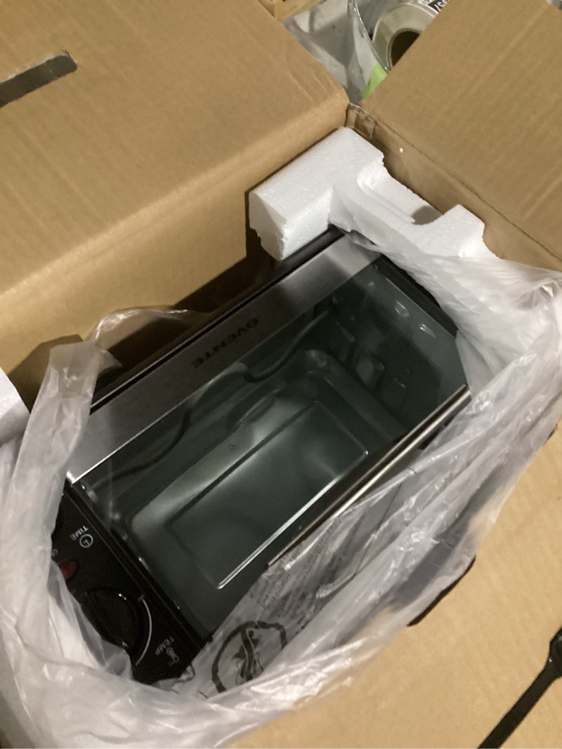 Condition photo showing Good Condition for ovente 8l countertop toaster oven with 60-minute timer, adjustable temperature control, easy-to-clean baking pan, 750w compact mini for pizza, toast, bake, and broil, black to2808b