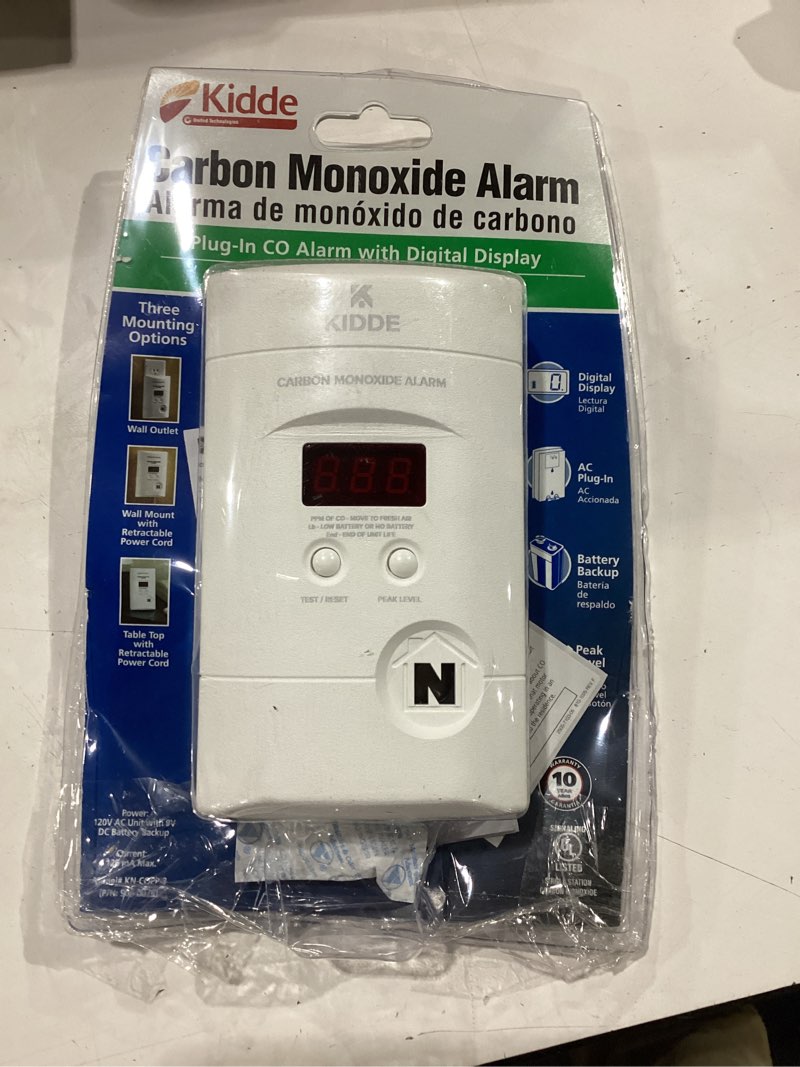 Condition photo showing Good Condition for kidde carbon monoxide detector, plug in wall with 9-volt battery backup, digital led display 1 pack white