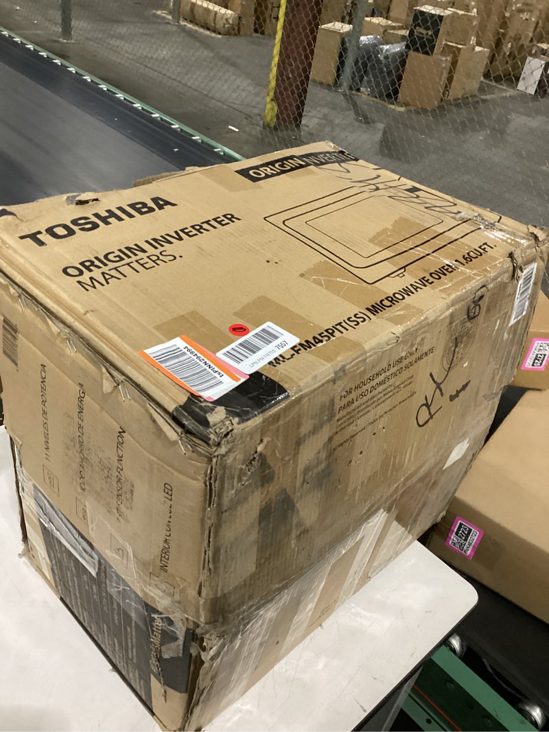 Condition photo showing As Is for toshiba ml-em45pit(ss) countertop microwave oven with inverter technology, kitchen essentials, smart sensor, auto defrost, 1.6 cu.ft, 13.6" removable turntable, 33lb.&1250w, stainless steel inverter-1.6 cu. ft.