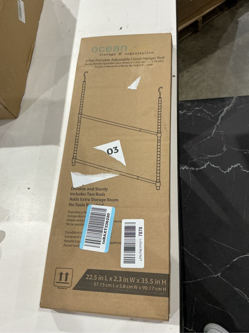 Condition photo showing New/Like New for oceanstar 2-tier portable adjustable closet hanger rod, black (acr1545b)