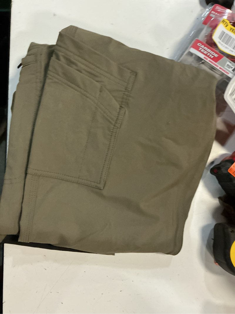 Condition photo showing New/Like New for milwaukee mens freflex strait fit tech pants size 34x32
