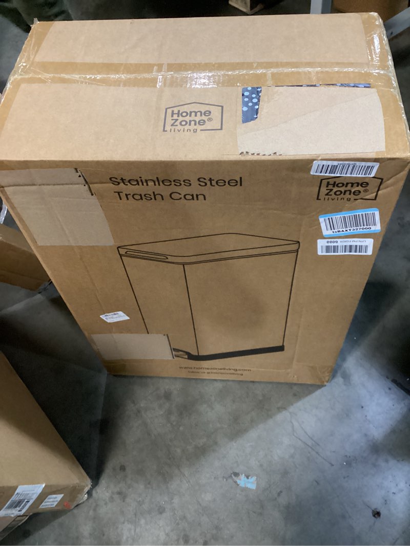 Condition photo showing New/Like New for home zone living 12 gallon slim kitchen trash can with soft close lid, step pedal, bag tuck band, and removable liner, stainless steel, silver