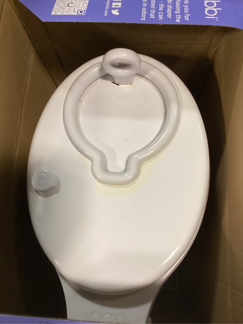 Condition photo showing As Is for ubbi steel diaper pail, odor locking, no special bag required, award-winning, registry must-have, white