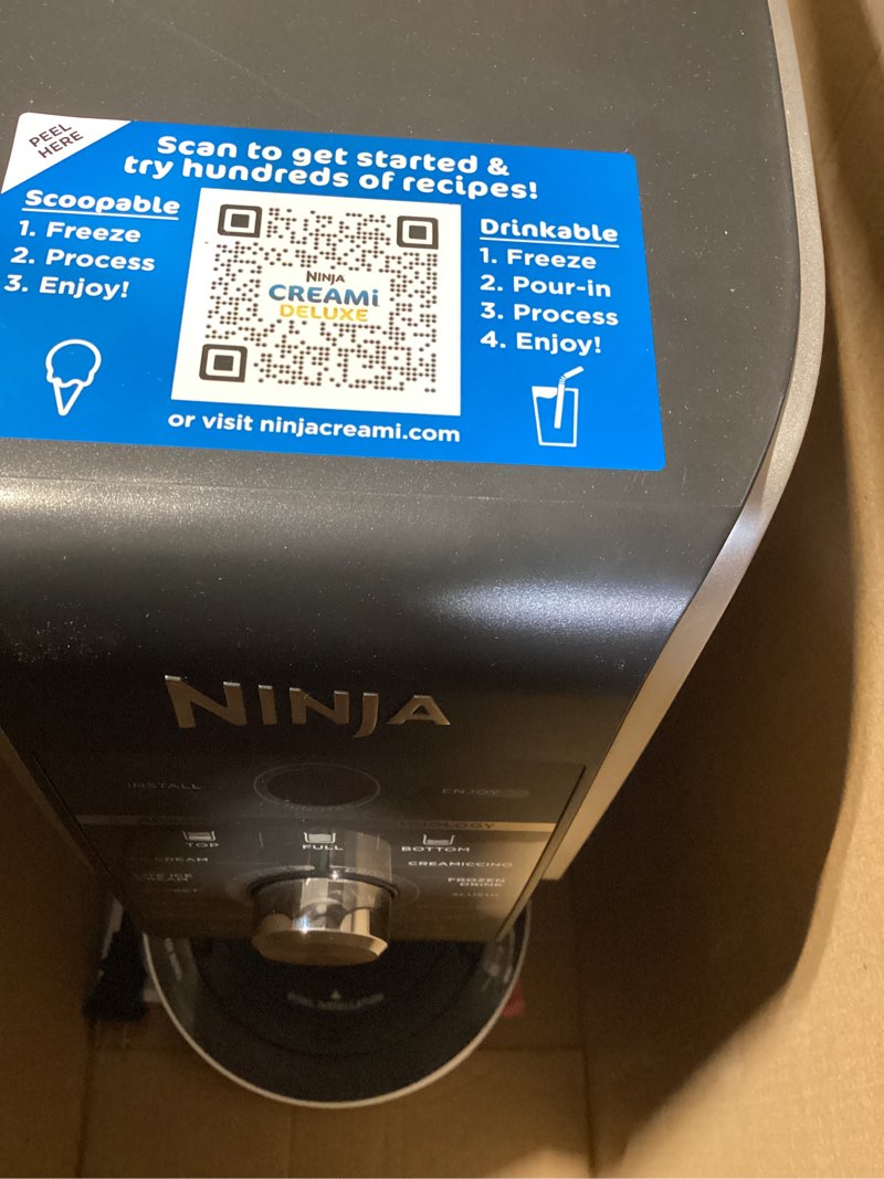 Condition photo showing As Is for ninja creami deluxe ice cream maker, treats and frozen desserts, sorbet, milkshakes, yogurt and more, 11-in-1 programs, xl capacity, includes two 24-oz family-size tubs, silver, nc501