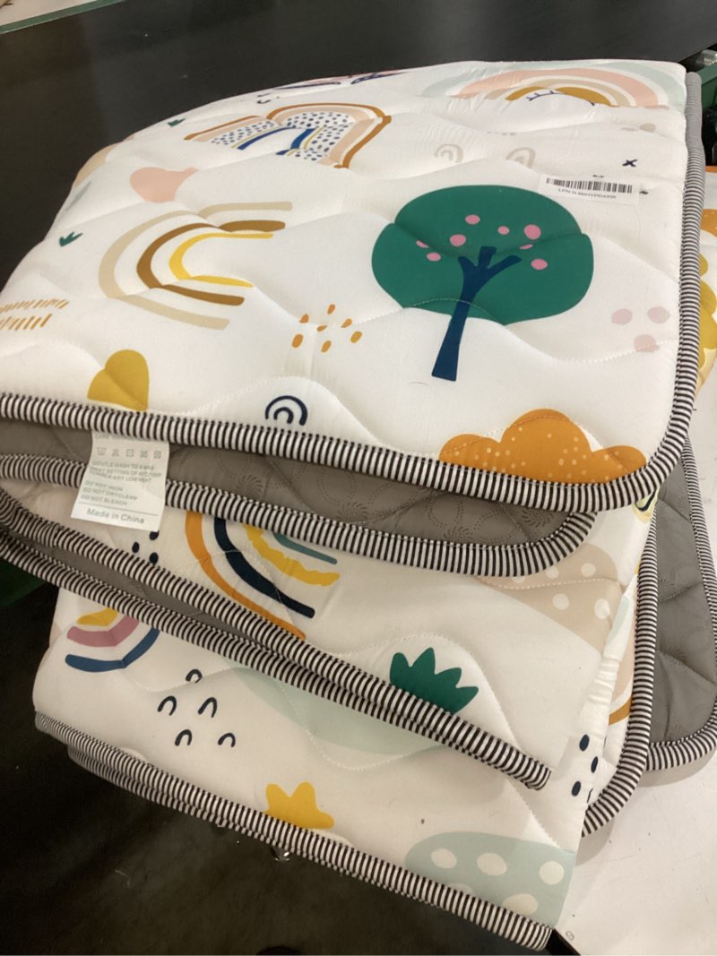 Condition photo showing Good Condition for baby play mat for floor, 71"x59" thickened playpen mat, soft non-slip baby play mat, foldable & machine washable, portable waterproof crawling playmats for infants & toddlers, rainbow and animal animals 71" x 59"